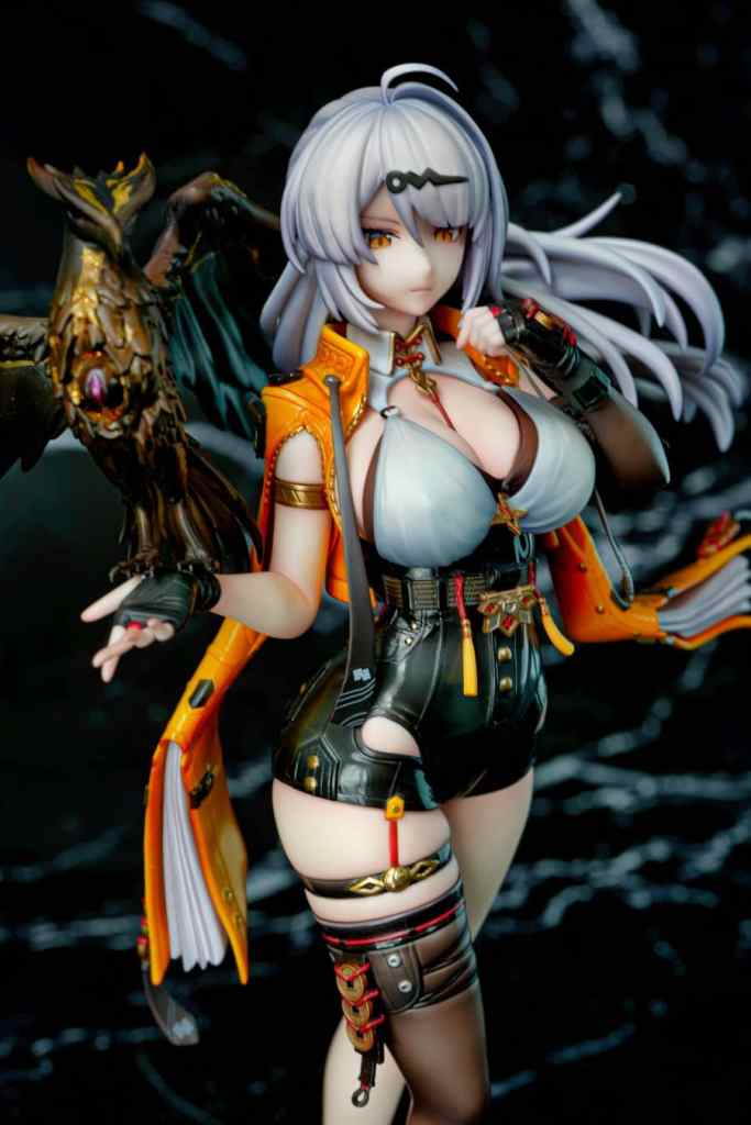 A detailed figurine of a female character with long gray hair, wearing a stylish outfit with an orange jacket and black shorts, accompanied by a decorative raven perched on her arm.