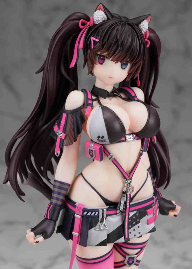 Close-up of a stylized anime figure with long hair styled in pigtails, wearing a revealing outfit featuring a combination of black, pink, and silver colors, adorned with accessories and straps.